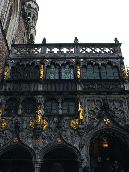 Ornate historic building facade with golden statues